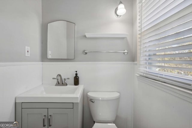 1522 Waltham Pl SE, Atlanta, GA 30316 - half bathroom with toilet, wainscoting, and vanity