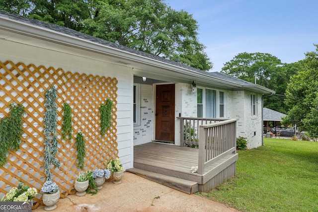 1522 Waltham Pl SE, Atlanta, GA 30316 - property entrance with covered porch, a yard, and brick siding