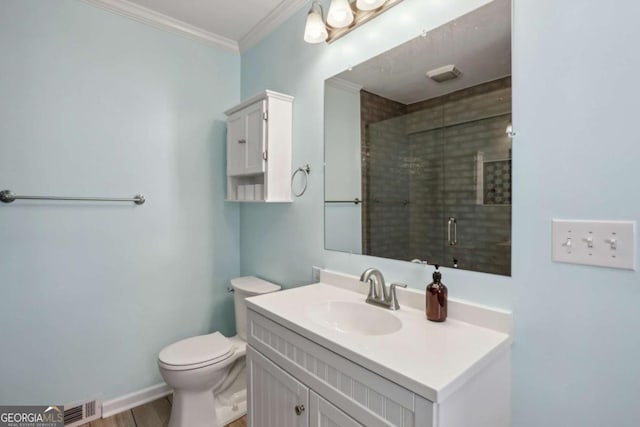 1522 Waltham Pl SE, Atlanta, GA 30316 - full bathroom with toilet, crown molding, visible vents, a shower stall, and vanity