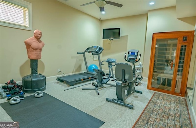 workout area with carpet flooring and ceiling fan