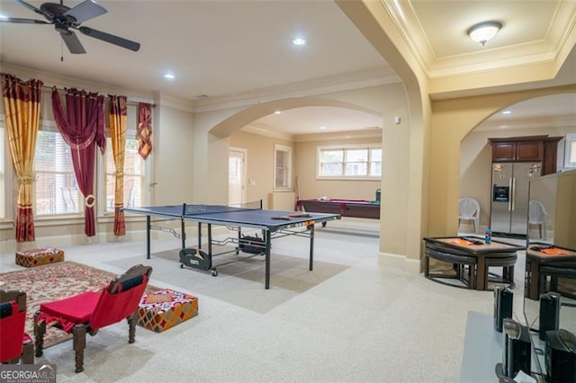 recreation room featuring ceiling fan, ornamental molding, light carpet, and pool table