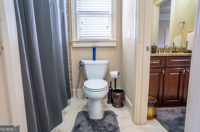 bathroom with toilet, vanity, tile patterned floors, and curtained shower