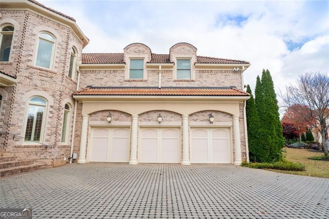 view of front of property featuring a garage