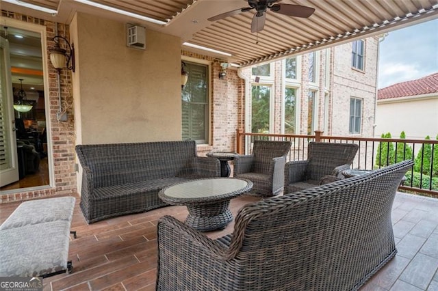 view of patio featuring ceiling fan