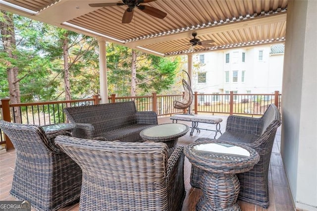 exterior space with an outdoor hangout area and ceiling fan