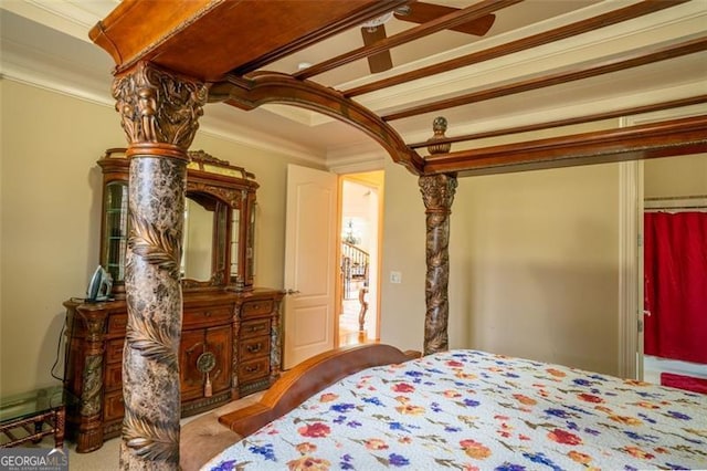 carpeted bedroom with ornamental molding