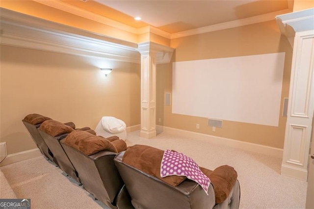 home theater room featuring crown molding and light carpet