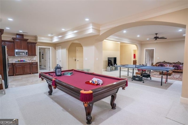 recreation room with light colored carpet, ceiling fan, ornamental molding, and pool table