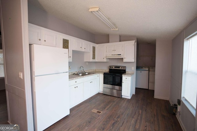 kitchen with sink, separate washer and dryer, stainless steel range with electric cooktop, white fridge, and white cabinets