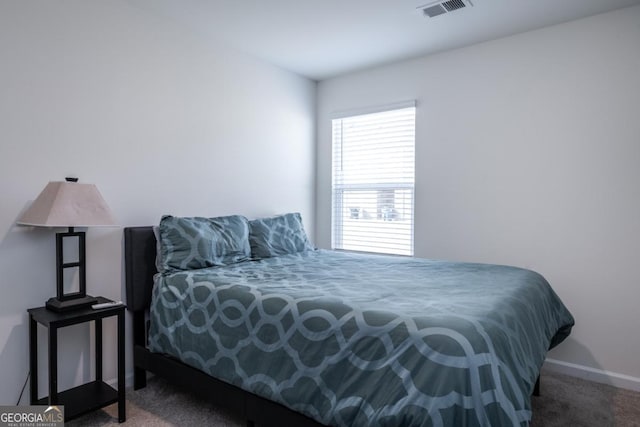 bedroom featuring carpet