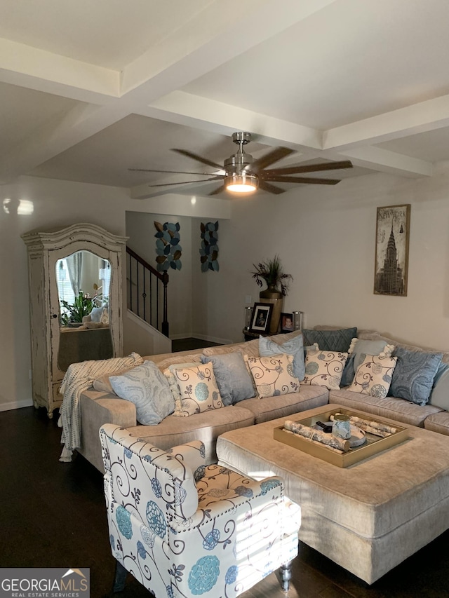 living room with ceiling fan, dark hardwood / wood-style flooring, and beamed ceiling