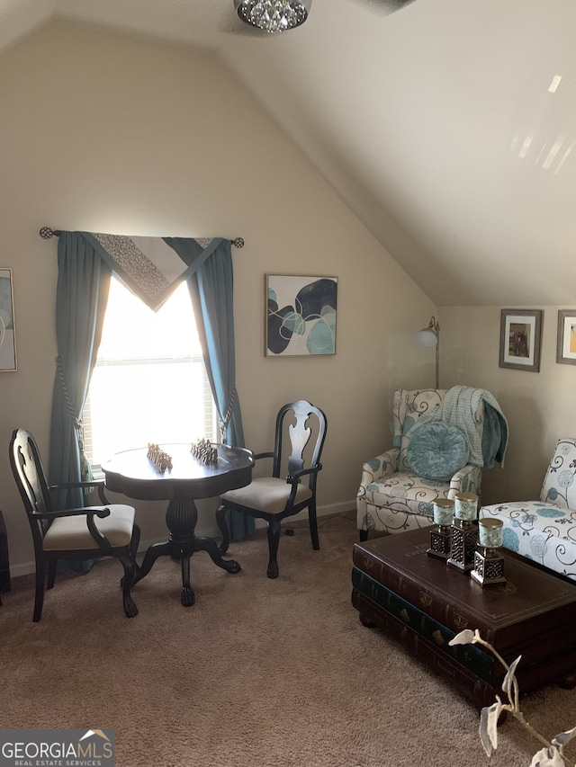 interior space with carpet flooring and lofted ceiling