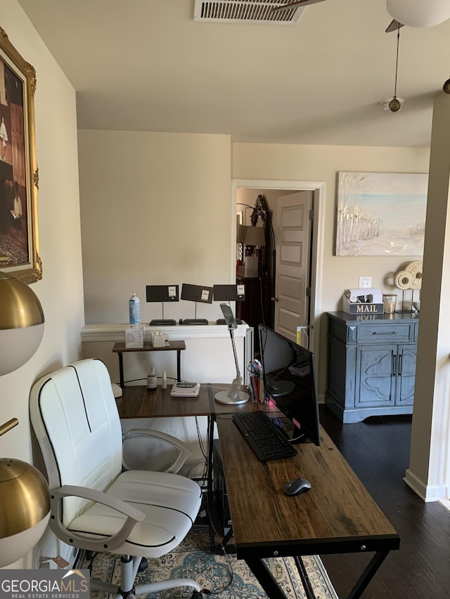 dining area featuring dark hardwood / wood-style flooring