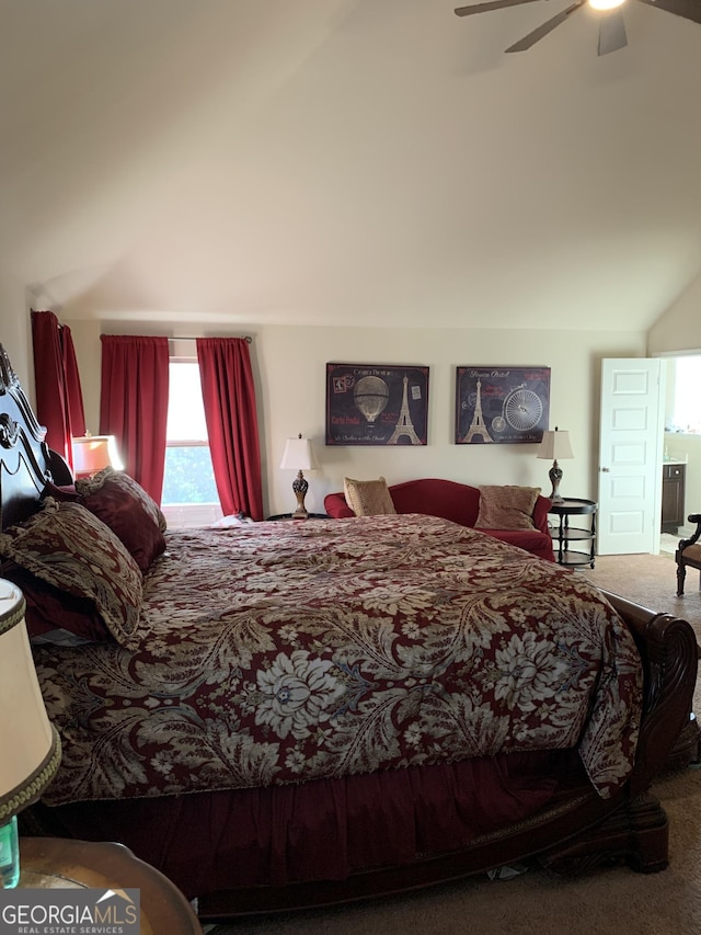 bedroom with carpet flooring, ceiling fan, and high vaulted ceiling