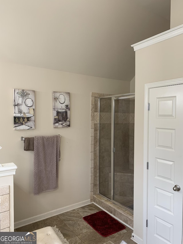 bathroom featuring an enclosed shower