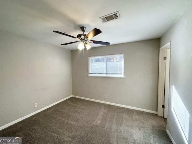 carpeted empty room with ceiling fan