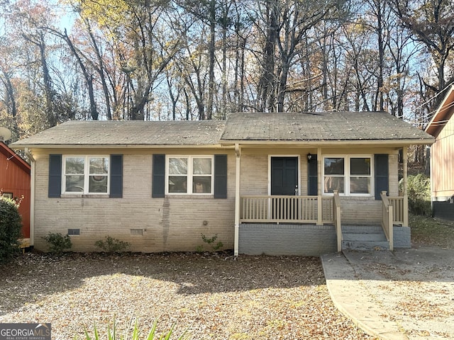 view of front of property featuring covered porch