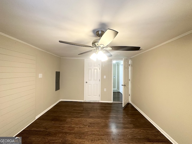 unfurnished room featuring electric panel, ceiling fan, dark wood-type flooring, and ornamental molding