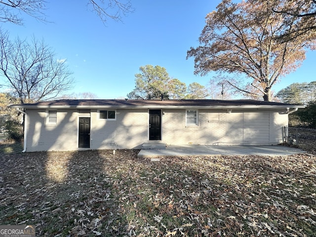 back of property featuring a patio