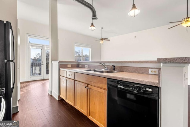 kitchen featuring french doors, black appliances, sink, dark hardwood / wood-style floors, and ceiling fan