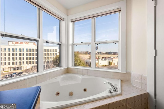 bathroom with tiled tub