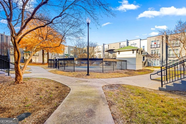 view of property's community with a pool