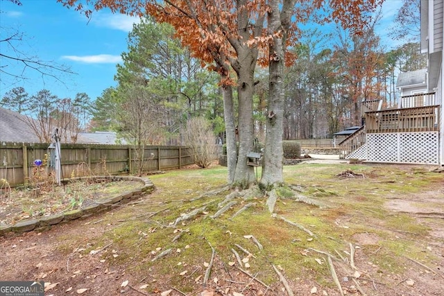 view of yard featuring a deck