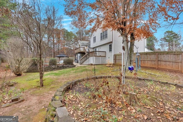 view of yard featuring a deck