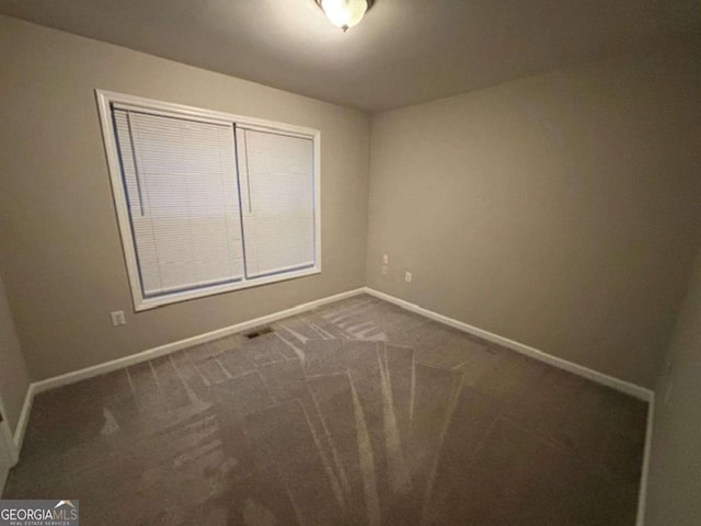 unfurnished bedroom featuring carpet flooring