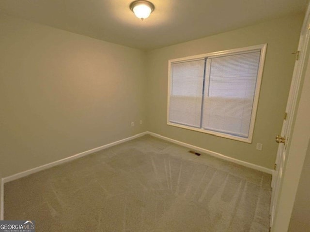 empty room featuring carpet