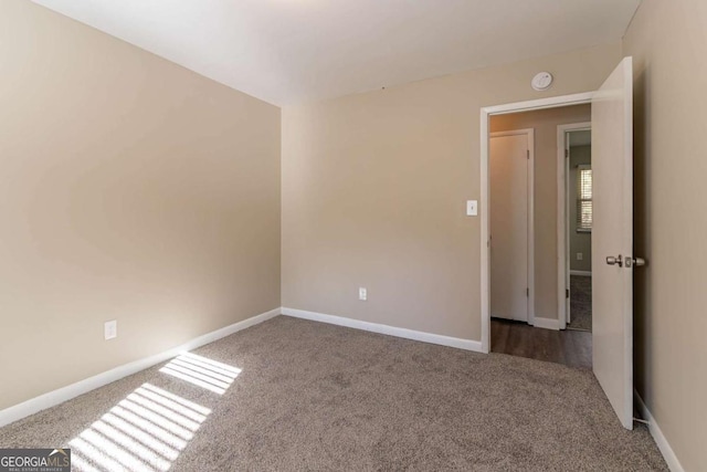 empty room featuring carpet floors