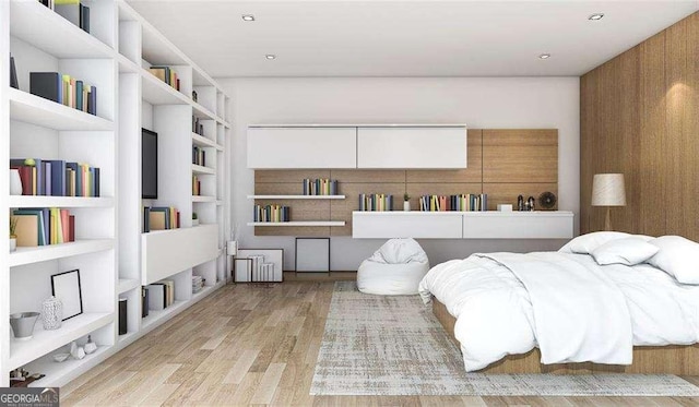 bedroom with light hardwood / wood-style floors