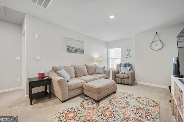 living room featuring light colored carpet