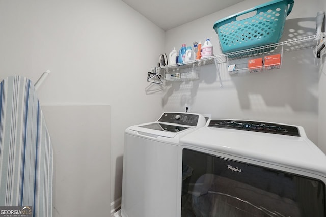 laundry room with washer and clothes dryer