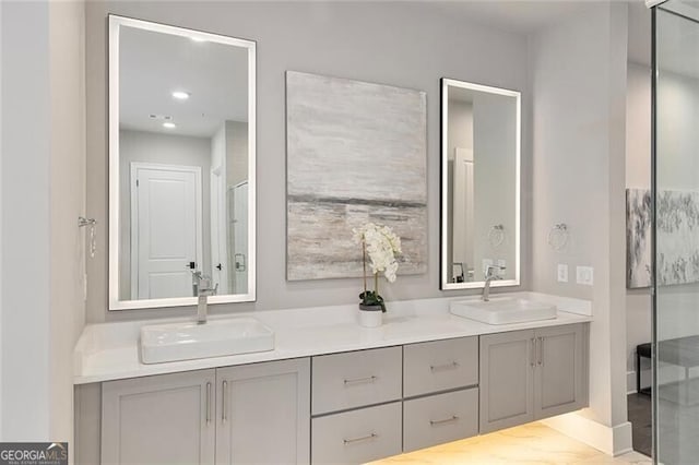 bathroom with vanity and walk in shower