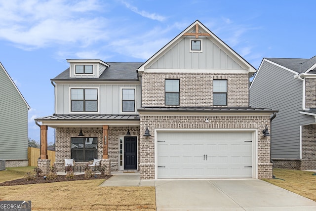 view of front of home with central AC, a porch, and a garage