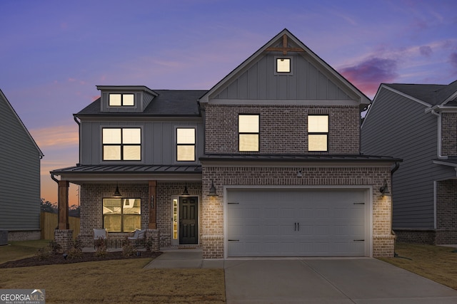 view of front of property with covered porch, central AC, and a garage