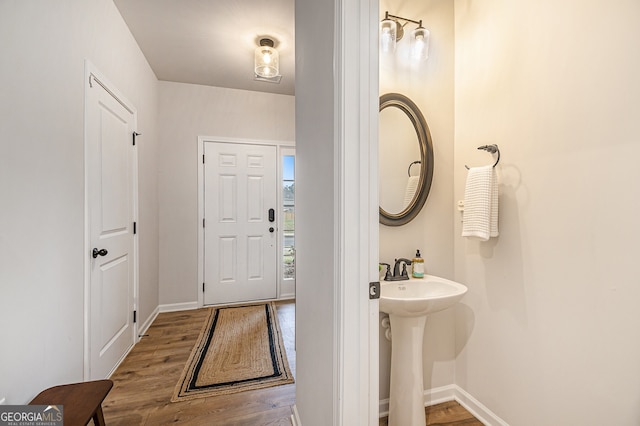 bathroom featuring hardwood / wood-style flooring