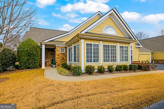 view of front of home with a front yard