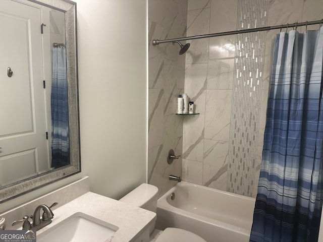 full bathroom with shower / tub combo with curtain, vanity, and toilet