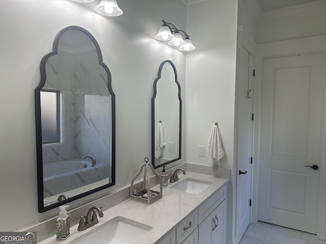 bathroom with a bath, vanity, and crown molding