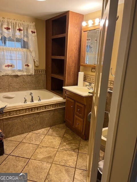 full bath with a bath and vanity