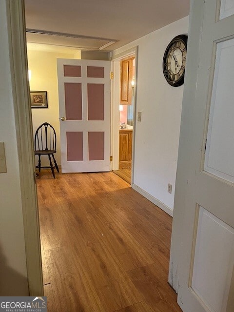 spare room featuring light wood finished floors