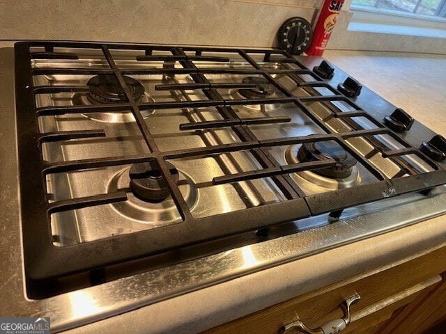 details featuring stainless steel gas cooktop