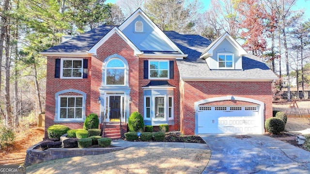 view of front of property featuring a garage