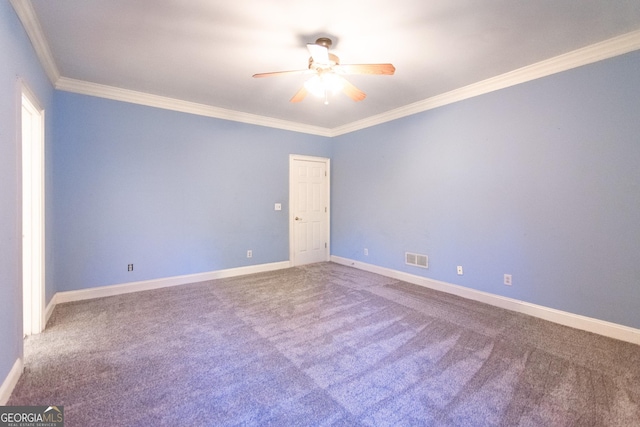 carpeted spare room with crown molding and ceiling fan