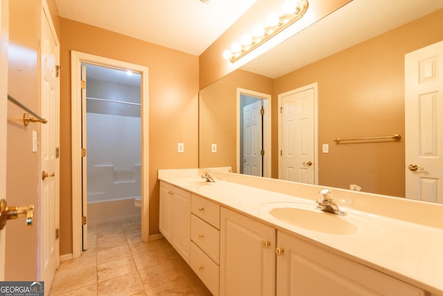 bathroom with tile patterned floors, vanity, and toilet