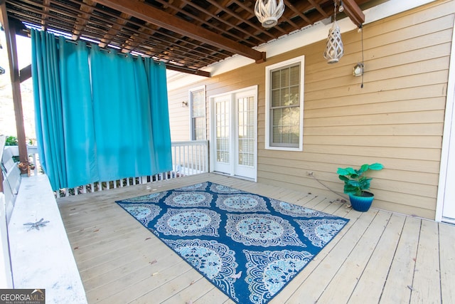 wooden deck with french doors