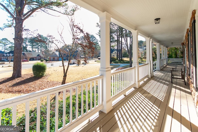 wooden terrace with covered porch