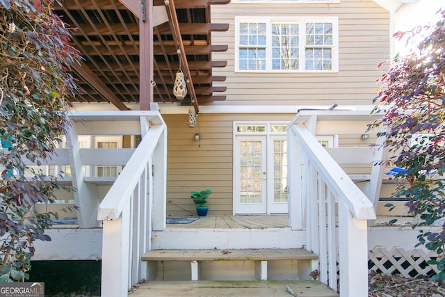 doorway to property featuring a deck